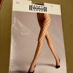 NWT- Wolford large fishnet tights in Large 🖤